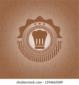 chef hat icon inside wood emblem