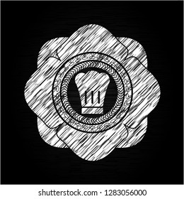 chef hat icon on chalkboard