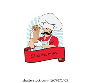 El chef sostiene un sándwich de shawarma