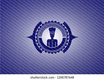 chef icon inside badge with denim texture