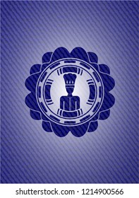 chef icon inside emblem with denim texture