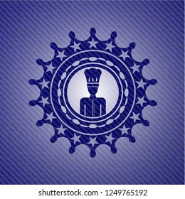chef icon inside emblem with denim texture