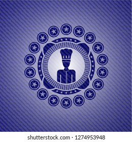 chef icon inside emblem with jean background