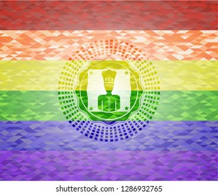 chef icon inside emblem on mosaic background with the colors of the LGBT flag