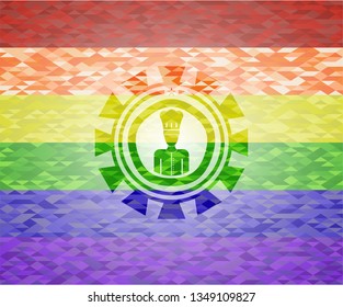 chef icon inside emblem on mosaic background with the colors of the LGBT flag