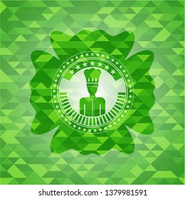 chef icon inside green emblem with mosaic ecological style background