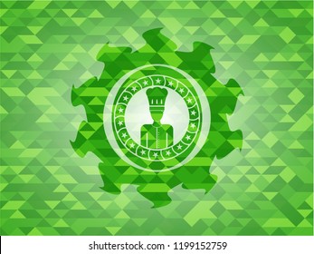chef icon inside realistic green emblem. Mosaic background