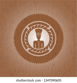chef icon inside retro style wooden emblem