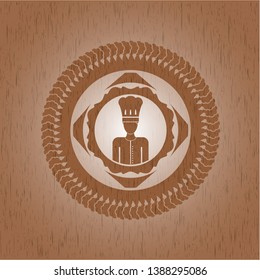 chef icon inside retro style wooden emblem