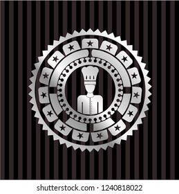 chef icon inside silvery badge or emblem