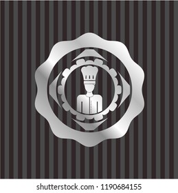 chef icon inside silvery emblem