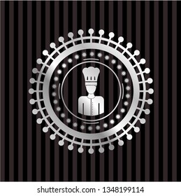 chef icon inside silvery emblem or badge