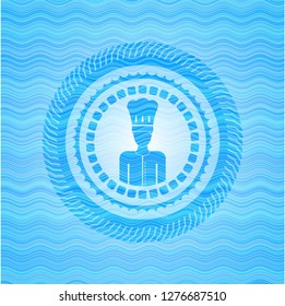 chef icon inside sky blue water wave badge background.
