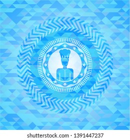chef icon inside sky blue emblem with triangle mosaic background