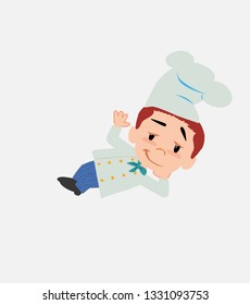 Chef lying, greets with a dreamy expression.