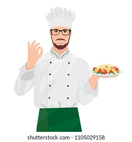 chef man in a cap and apron in a restaurant holding a delicious dish in a plate Caesar salad