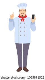 Chef with mobile phone pointing up. Full length portrait of Chef in a flat style. Vector illustration.