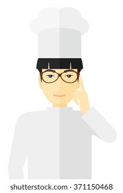 Chef pointing forefinger up.