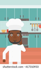 Chef pointing forefinger up.