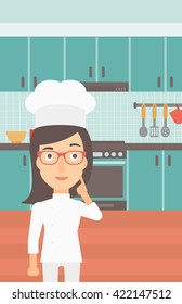 Chef pointing forefinger up.