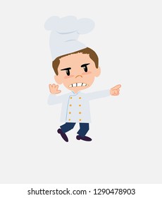 Chef points angrily to his left.
