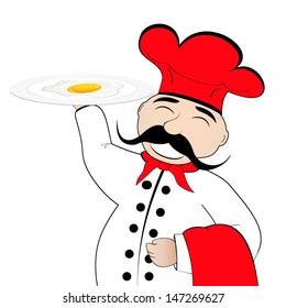 chef with scrambled eggs on a plate 