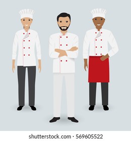 Chef and two cook in uniform standing together in three different poses. Cooking people characters. Flat vector illustration