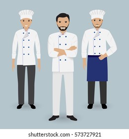 Chef y dos cocineros uniformados. Personajes de cocina. Ilustración vectorial plana...