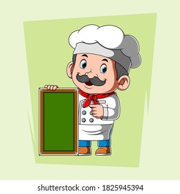 The chef with the white apron holding the green blank board 

