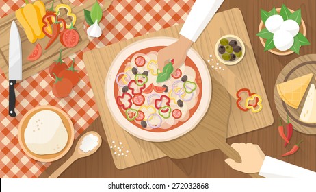 Chefs cooking a tasty traditional vegetables pizza, hands working top view with kitchen utensils, ingredients and wooden worktop