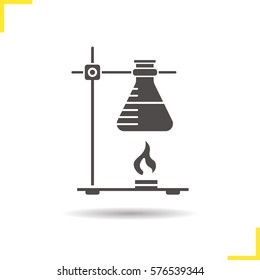 Chemical reaction glyph icon. Drop shadow silhouette symbol. Ring stand with flask over fire. Negative space. Vector isolated illustration