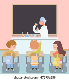 chemistry lesson. Students observe chemical experiments at school. A scientist mixes chemicals and watching the reactions