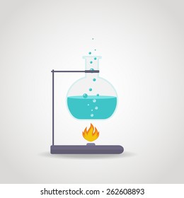 Chemistry tube with blue liquid on lab burner.