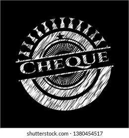 Cheque chalk emblem written on a blackboard