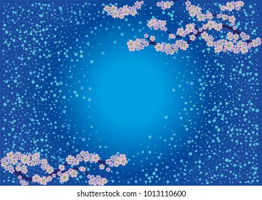 Cherry blossom branch with falling petals on a blue background