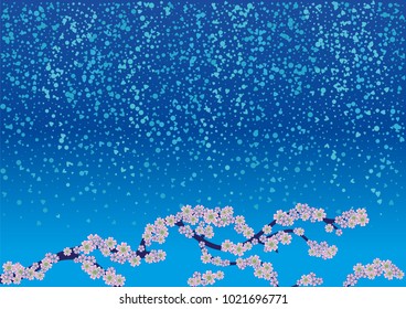 Cherry blossom branch with falling petals on a blue background