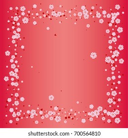 Cherry blossom on red background. Beautiful square sakura frame or border of random scatter flowers, dots, hearts and petals.