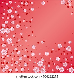 Cherry blossom on red background. Beautiful falling sakura pattern. Random scatter explosion of flowers, dots, hearts and petals.