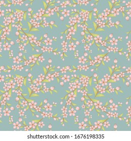 Cherry blossom seamless pattern. Elegant vector floral texture. Japanese sakura bloom. Vintage ornament with pink cherry flowers, green leaves, branches on blue background. Repeat tileable design 