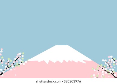 Cherry blossom tree in front of a mountain.