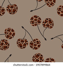 Cherry with a leopard pattern. Berry background. Ornament in beige tones