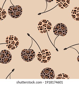 Cherry with a leopard pattern. Berry background. Ornament in beige tones