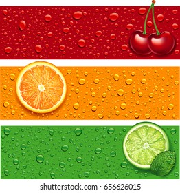cherry, orange, lime and mint on background with many water drops