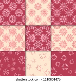 Cherry red and beige floral ornaments. Collection of seamless patterns for paper, textile