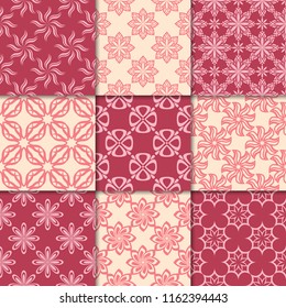 Cherry red and beige floral ornaments. Collection of seamless patterns for paper, textile