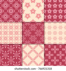 Cherry red and beige floral ornaments. Collection of seamless patterns for paper, textile