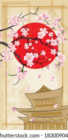 Cherry tree - sakura to the background of the sun and Japanese house