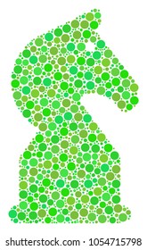 Chess Horse mosaic of circle elements in variable sizes and green color tinges. Vector dots are united into chess horse illustration. Freshness design concept.