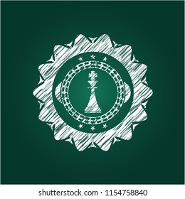 chess king icon drawn on a chalkboard