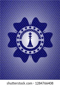 chess king icon inside badge with jean texture